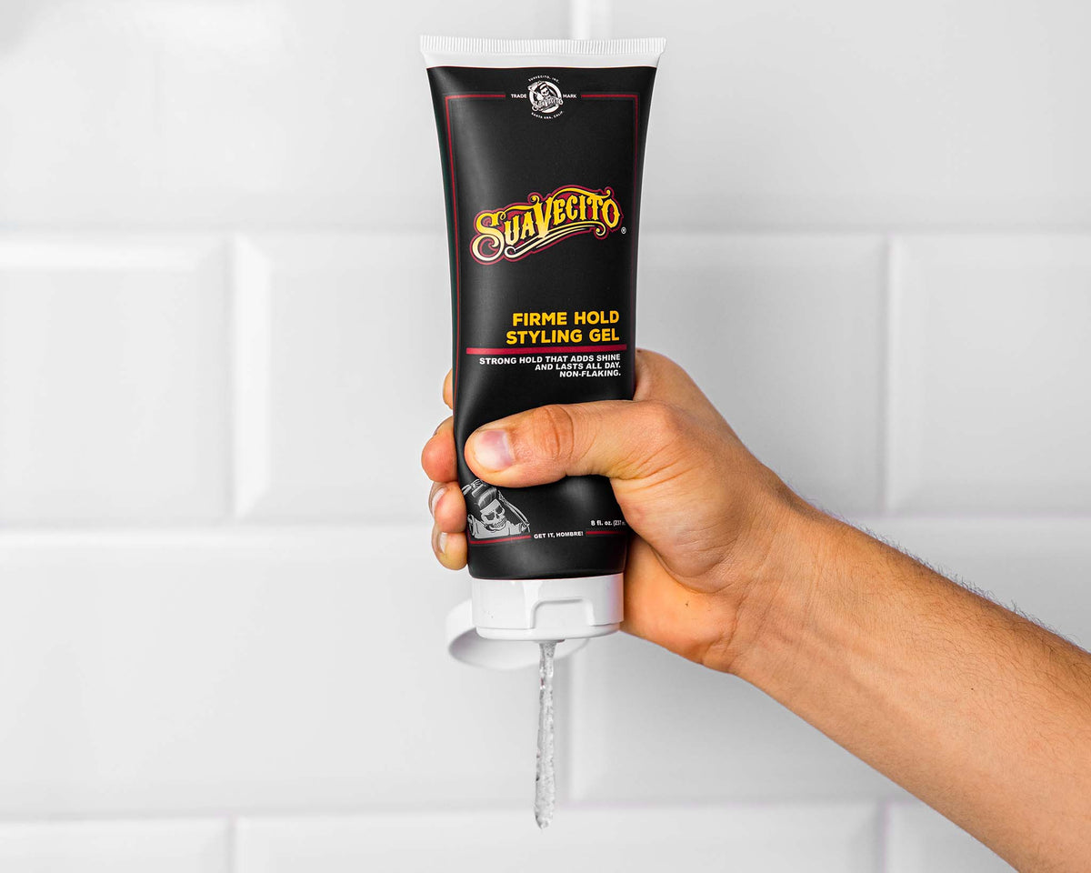front of firme hold styling gel being squeezed 
